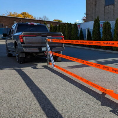 Rear view of HitchRail installed on a pickup truck hitch.